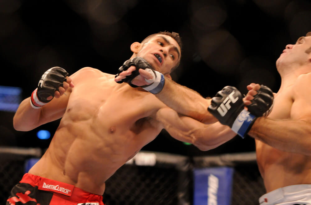 24 SEPTEMBER 2011: Tony Ferguson exchanges blows with Aaron Riley during UFC 135 at the Pepsi Center in Denver, Colorado.