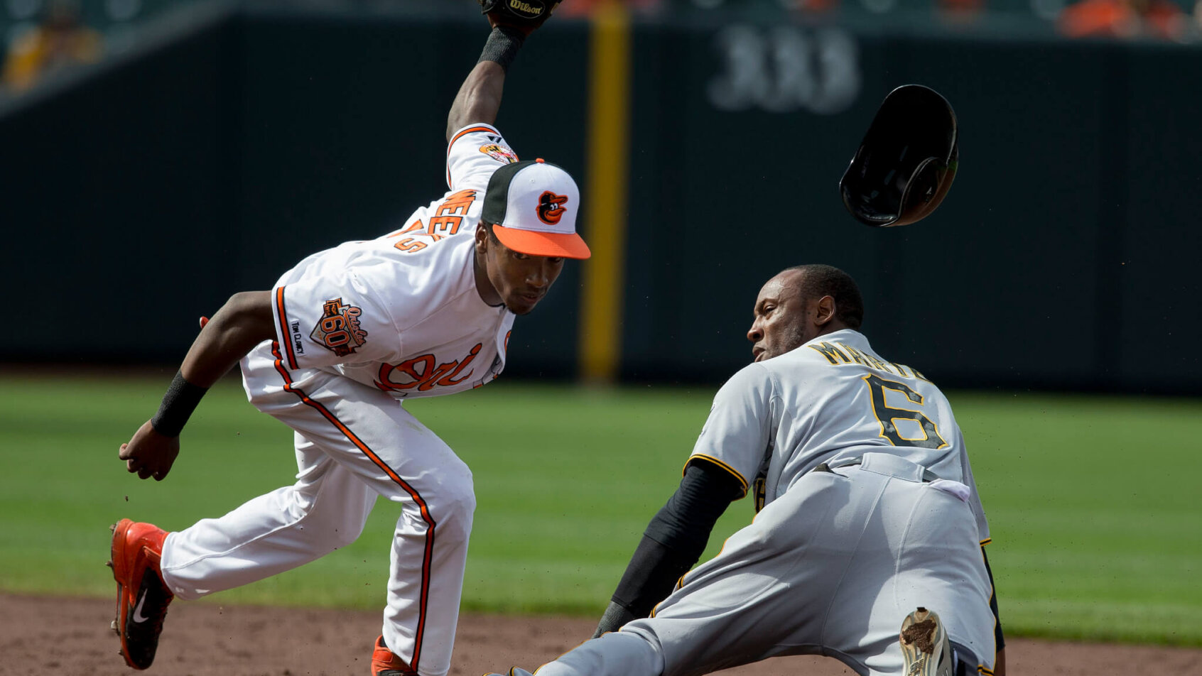 Starling Marte slides into second base.
