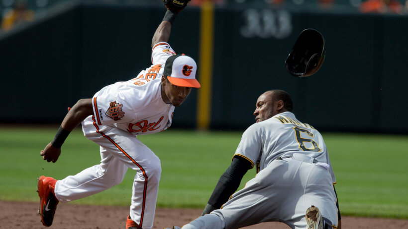 Starling Marte slides into second base.