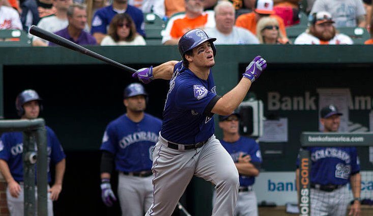 Nolan Arenado connects with a pitch
