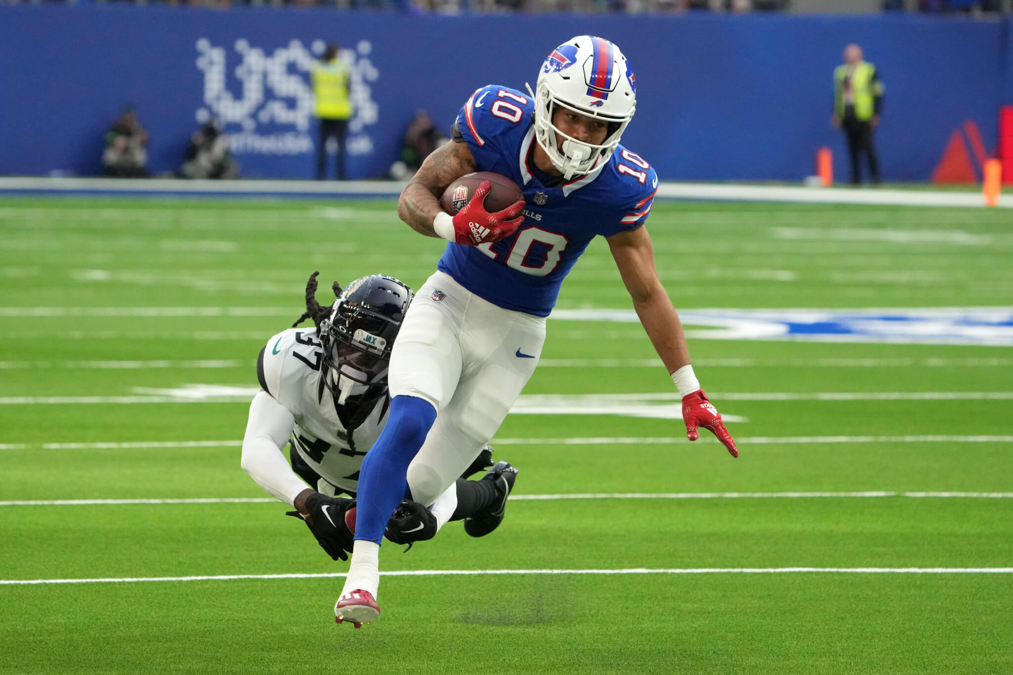 Buffalo Bills wide receiver Khalil Shakir running away from Jacksonville Jaguars cornerback Tre Herndon