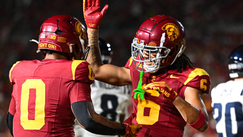 USC Trojans running back Quinten Joyner celebrates with USC Trojans wide receiver Makai Lemon