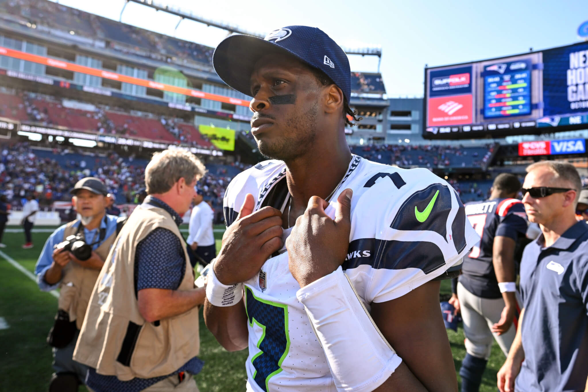 Geno Smith on the field after a game