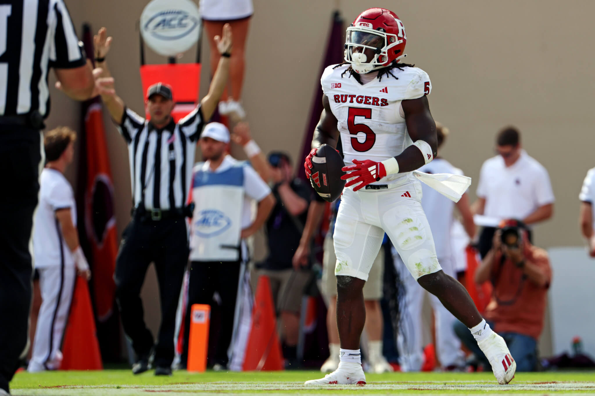 Kyle Monangai celebrates a touchdown.