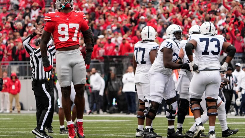 Ohio State Buckeyes defensive end Kenyatta Jackson Jr celebrates a sack against Penn State