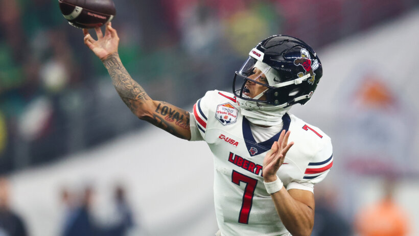 Liberty Flames quarterback Kaidon Salter throws football