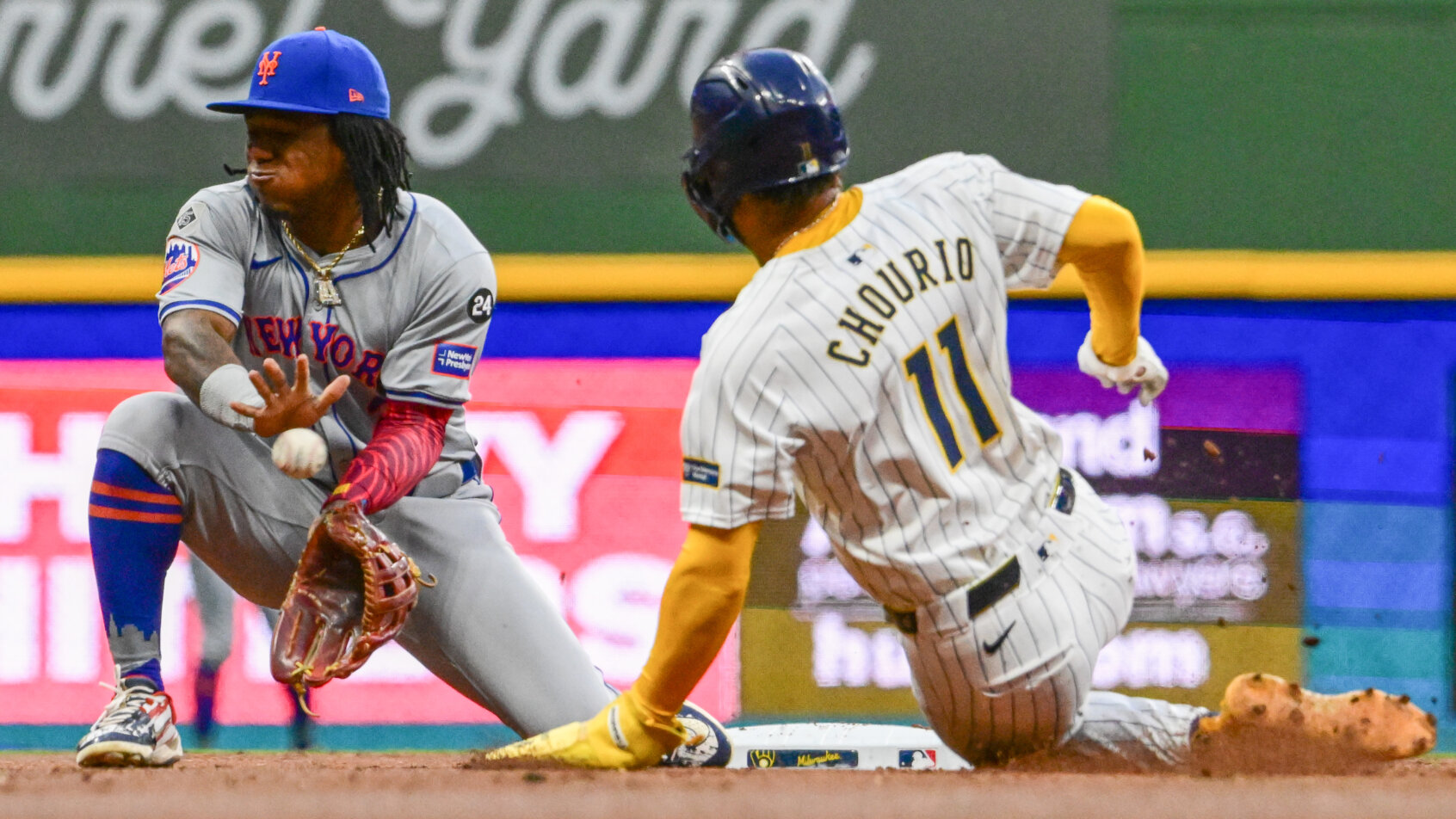 Milwaukee Brewers right fielder Jackson Chourio slides into second against the New York Mets