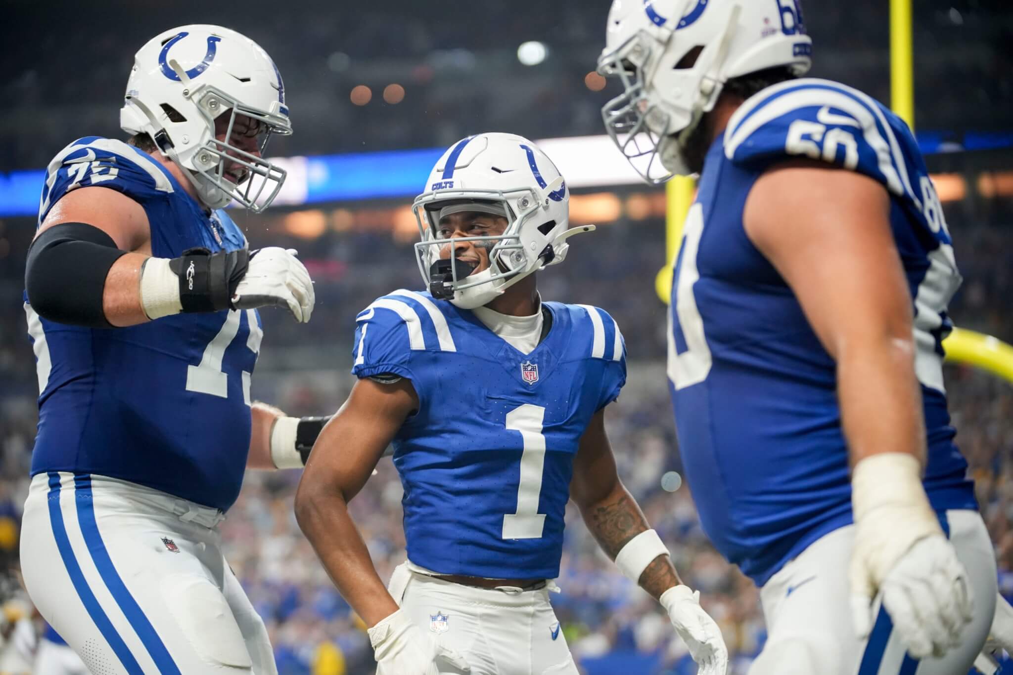 Josh Downs celebrating with his teammates