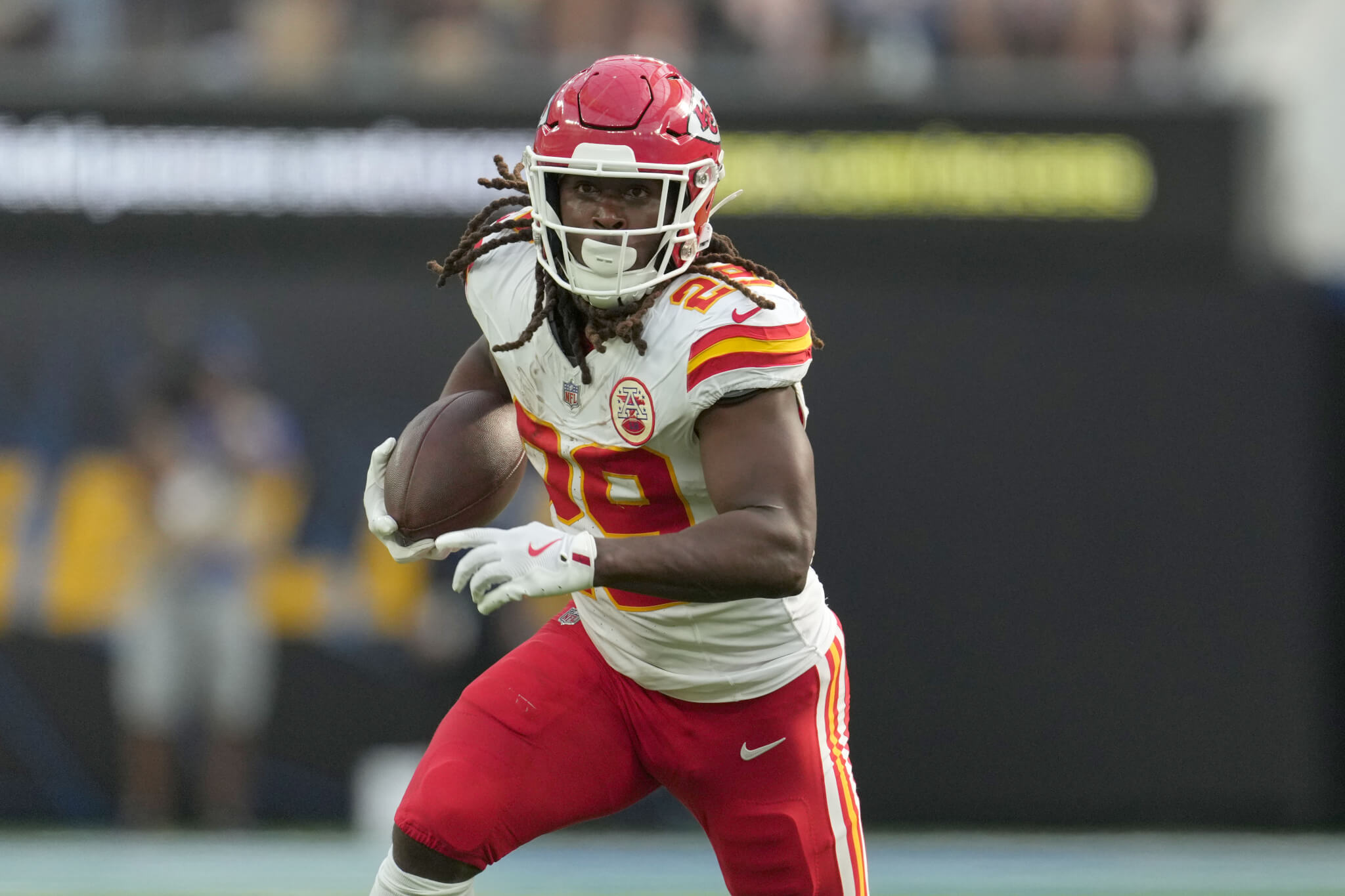 Kansas City Chiefs running back Kareem Hunt rushing with the ball