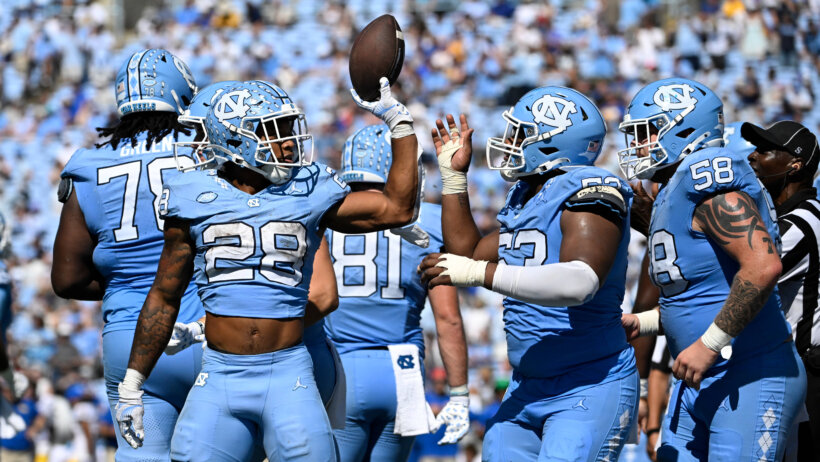 North Carolina Tar Heels running back Omarion Hampton with the ball