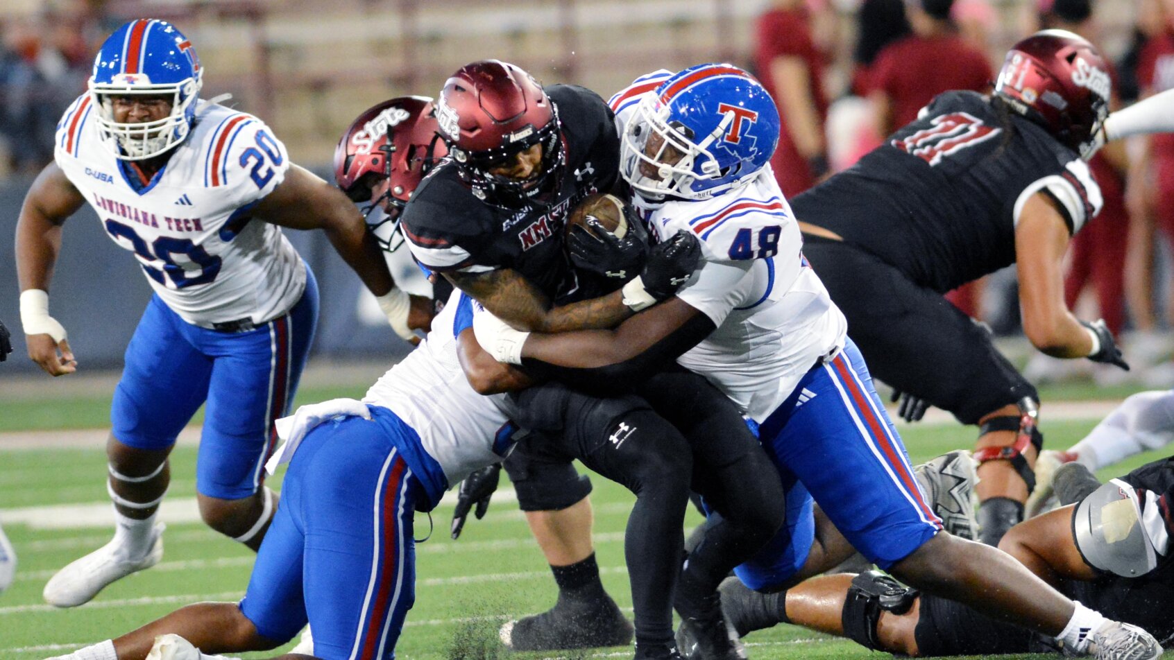 Louisiana Tech stuffs the NMSU rush attempt.