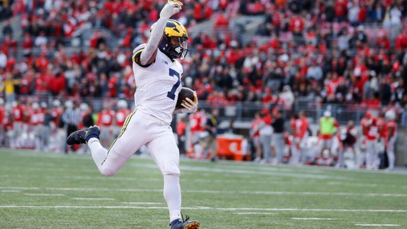 Michigan running back Donovan Edwards runs for a touchdown against Ohio State
