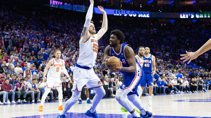Philadelphia 76ers center Joel Embiid defended by New York Knicks center Isaiah Hartenstein