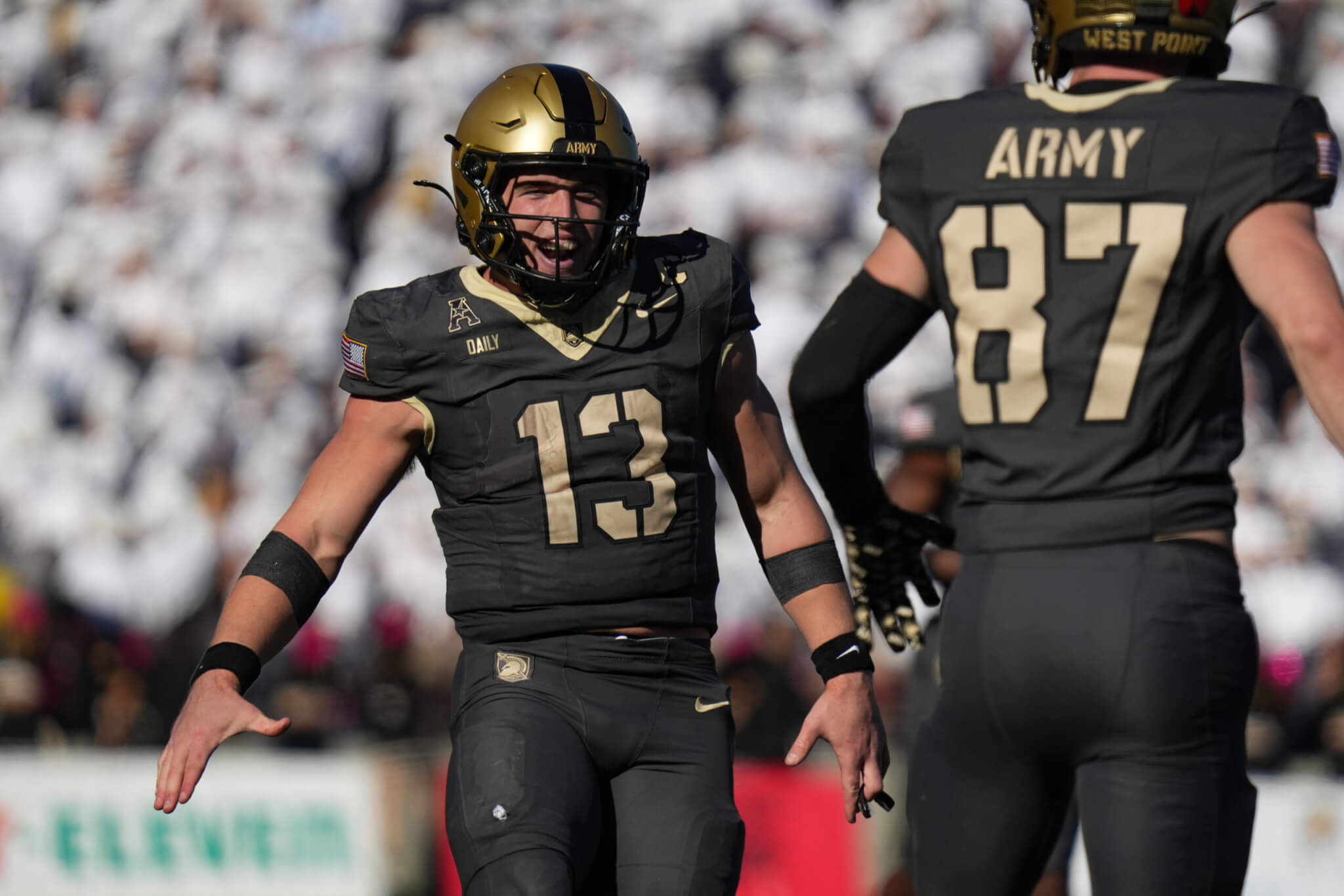 Army Black Knights quarterback Bryson Daily reacts to a catch