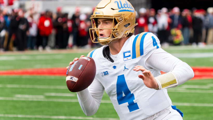 UCLA Bruins quarterback Ethan Garbers scrambles out of bounds