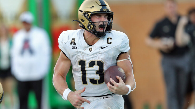 Army Black Knights quarterback Bryson Daily celebrates after scoring