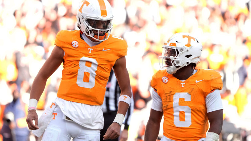 Tennessee, USA; Tennessee Volunteers quarterback Nico Iamaleava talks with running back Dylan Sampson