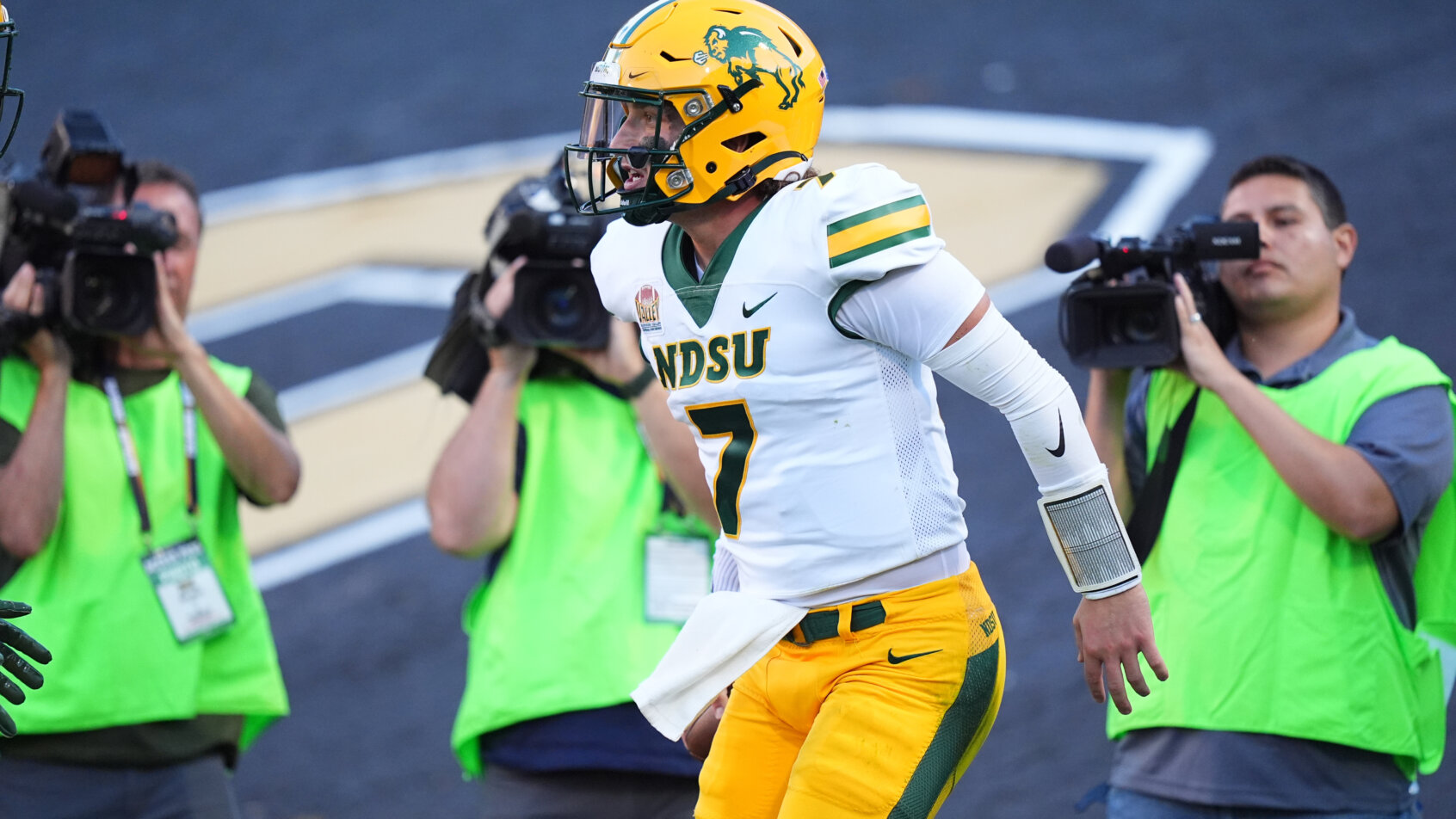 Cam Miller celebrates a rushing touchdown.