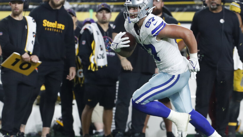 Dallas Cowboys tight end Jake Ferguson running with the ball