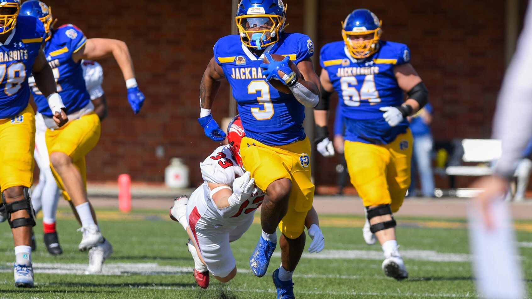 Amar Johnson running with football