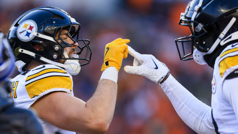 Pittsburgh Steelers tight end Pat Freiermuth reacts after scoring a touchdown