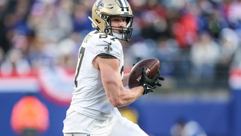 New Orleans Saints tight end Foster Moreau runs with the ball after making a catch