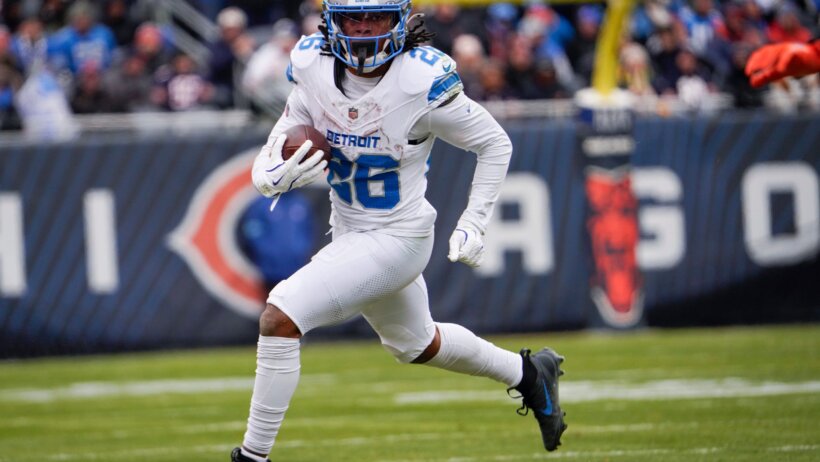 Detroit Lions running back Jahmyr Gibbs running with the ball