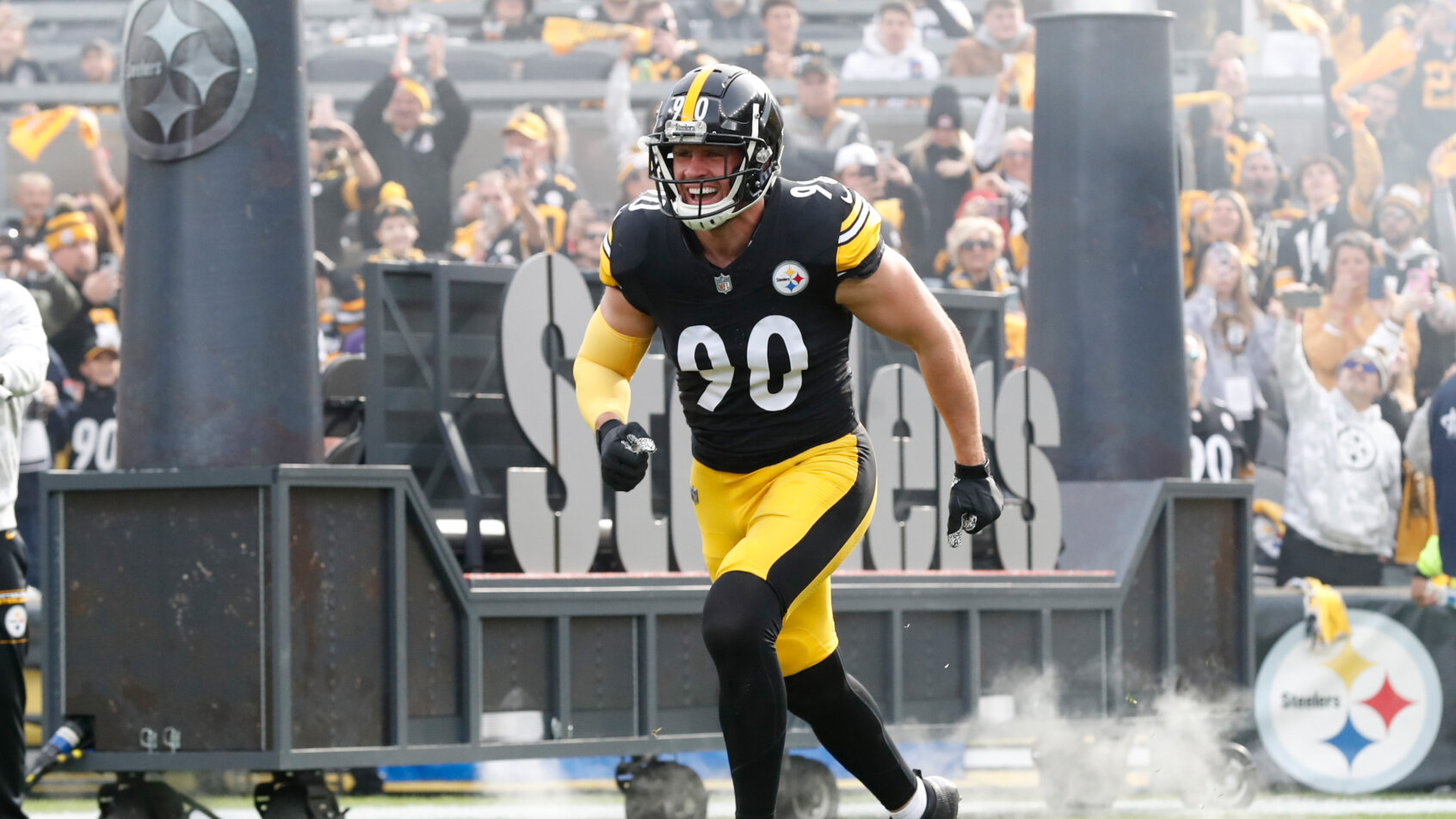 T.J. Watt runs out onto the field.