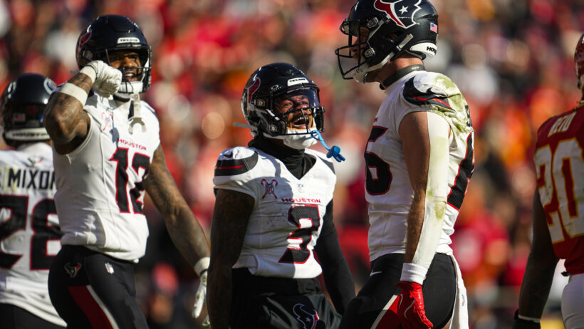 Houston Texans tight end Dalton Schultz celebrates with wide receiver Nico Collins