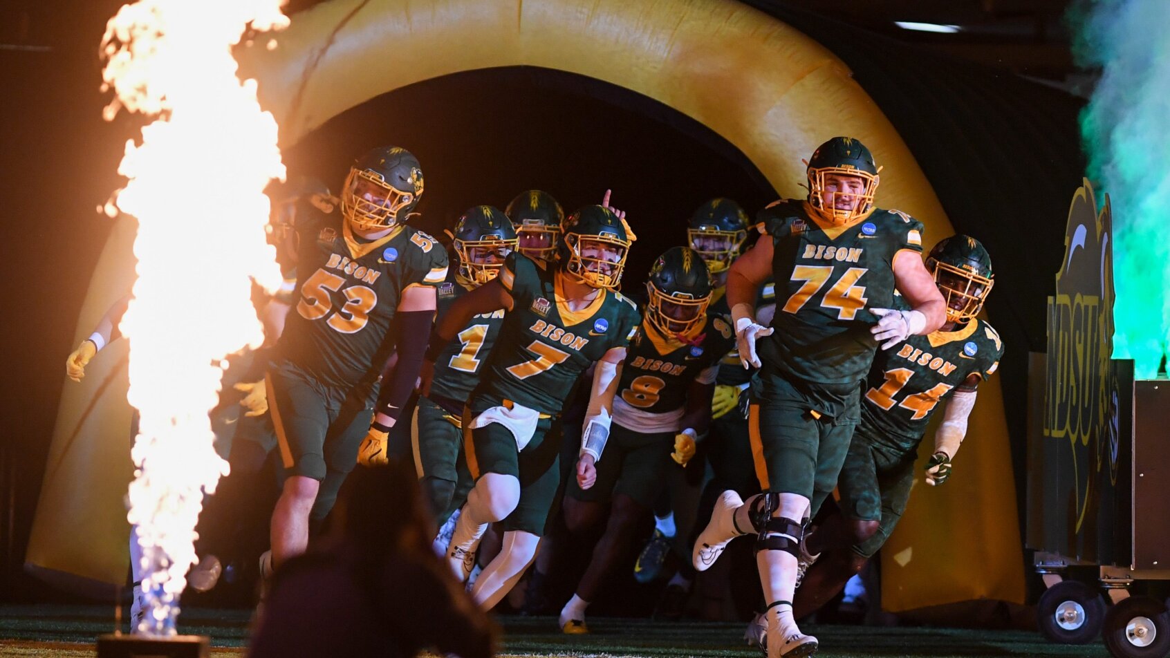 North Dakota State players run onto field