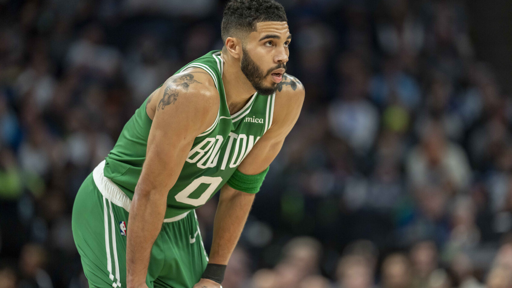 Jayson Tatum hands on shorts