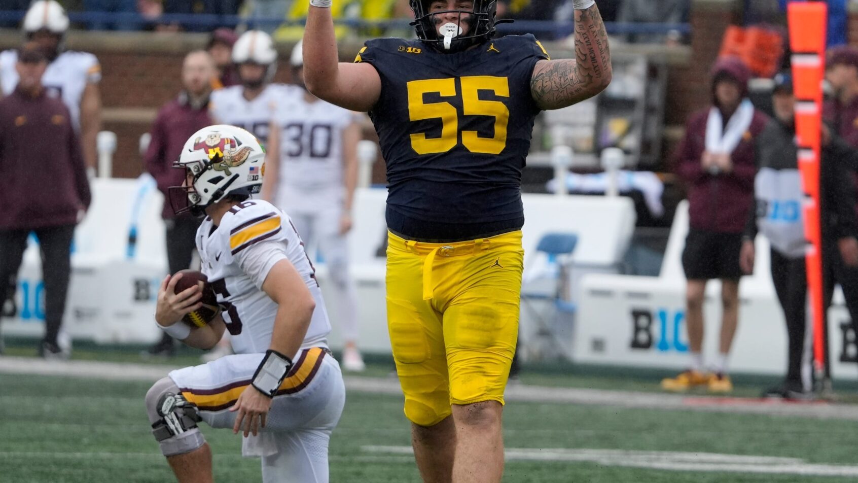 Mason Graham celebrates a sack versus Minnesota.