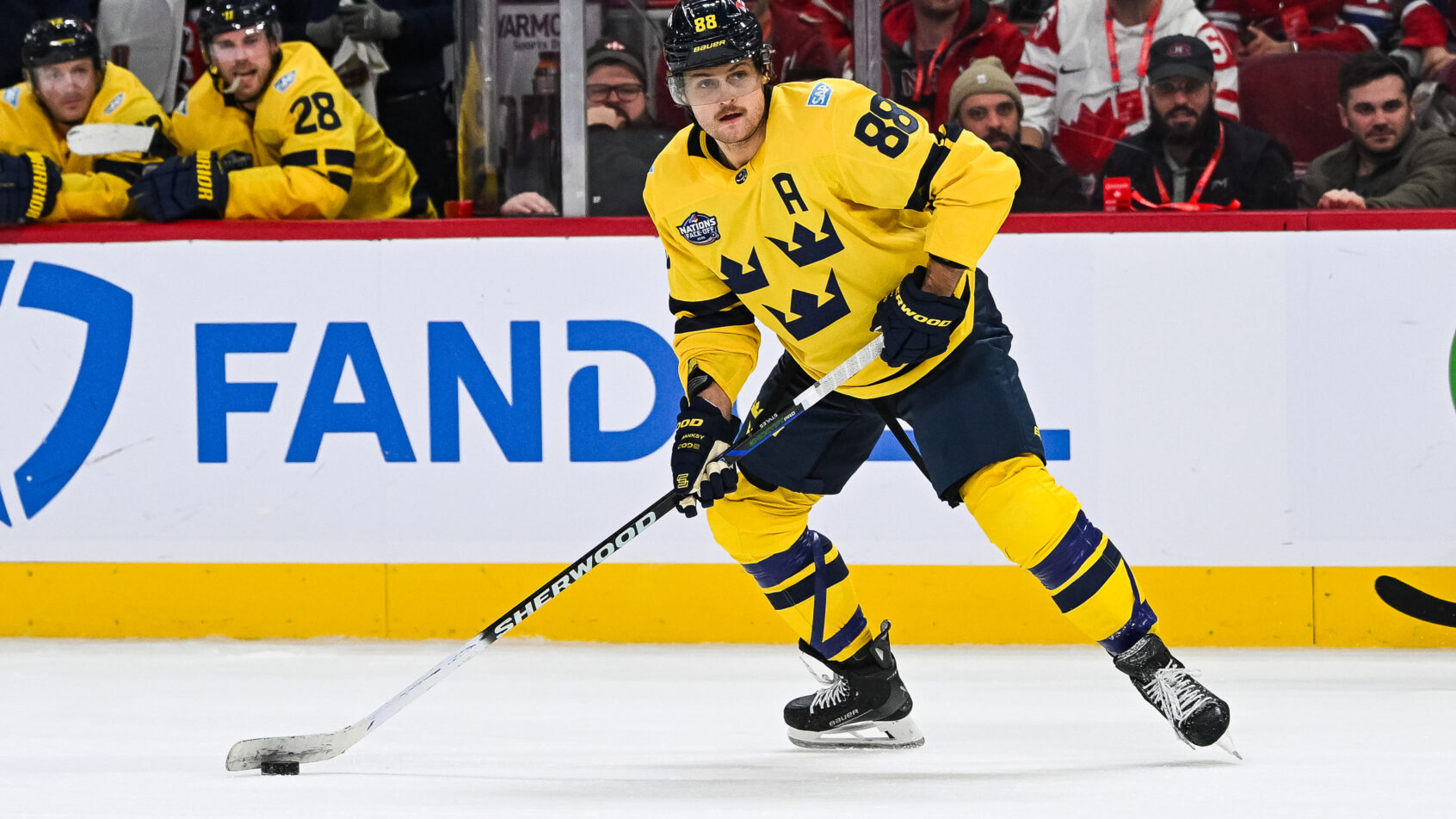 William Nylander controls the puck in a 4 Nations game versus Canada.
