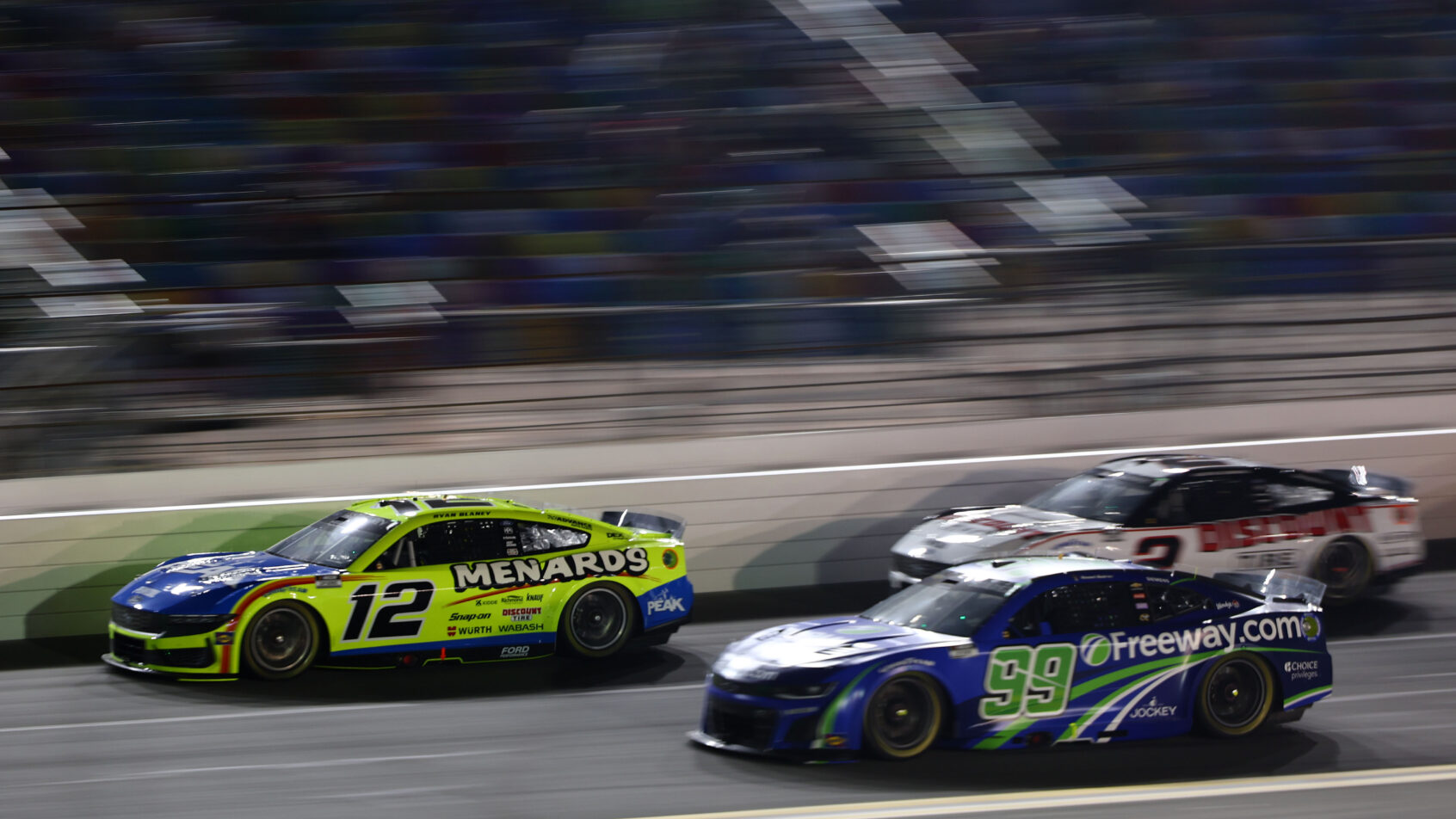 NASCAR Cup Series driver Ryan Blaney leading the field