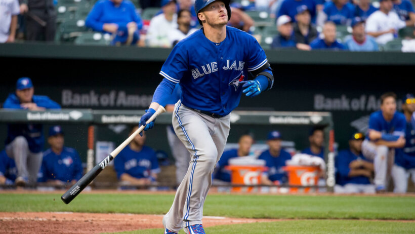 Josh Donaldson runs to first base after connecting with a pitch.