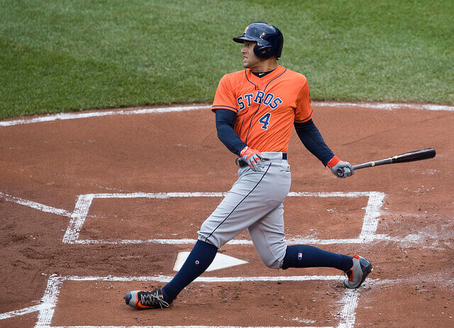 George Springer swinging bat