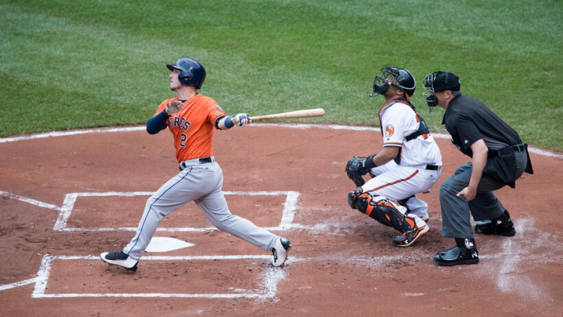 Alex Bregman takes a big cut against the Orioles.