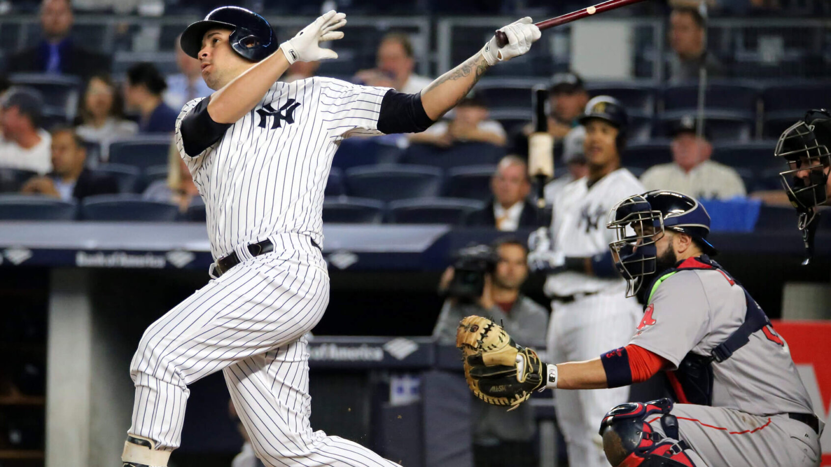 Yankees catcher Gary Sanchez hits a deep home run.