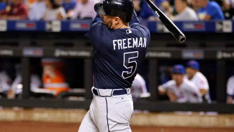 Braves first baseman Freddie Freeman swings at a pitch.