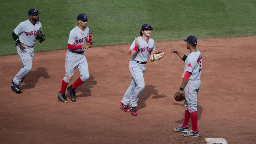 Red Sox players celebrate.