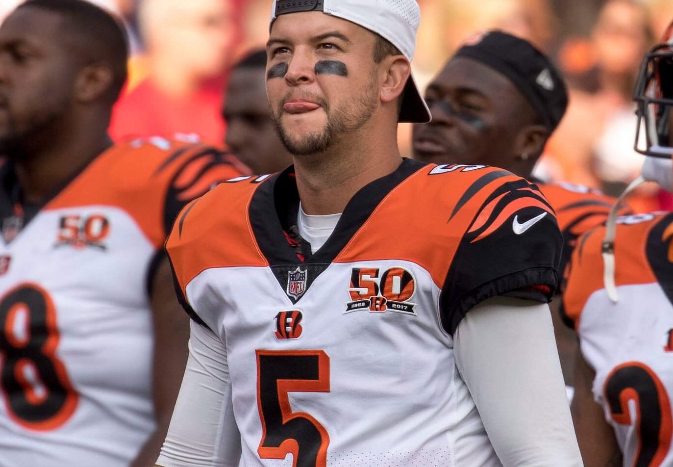 AJ McCarron walking off the field