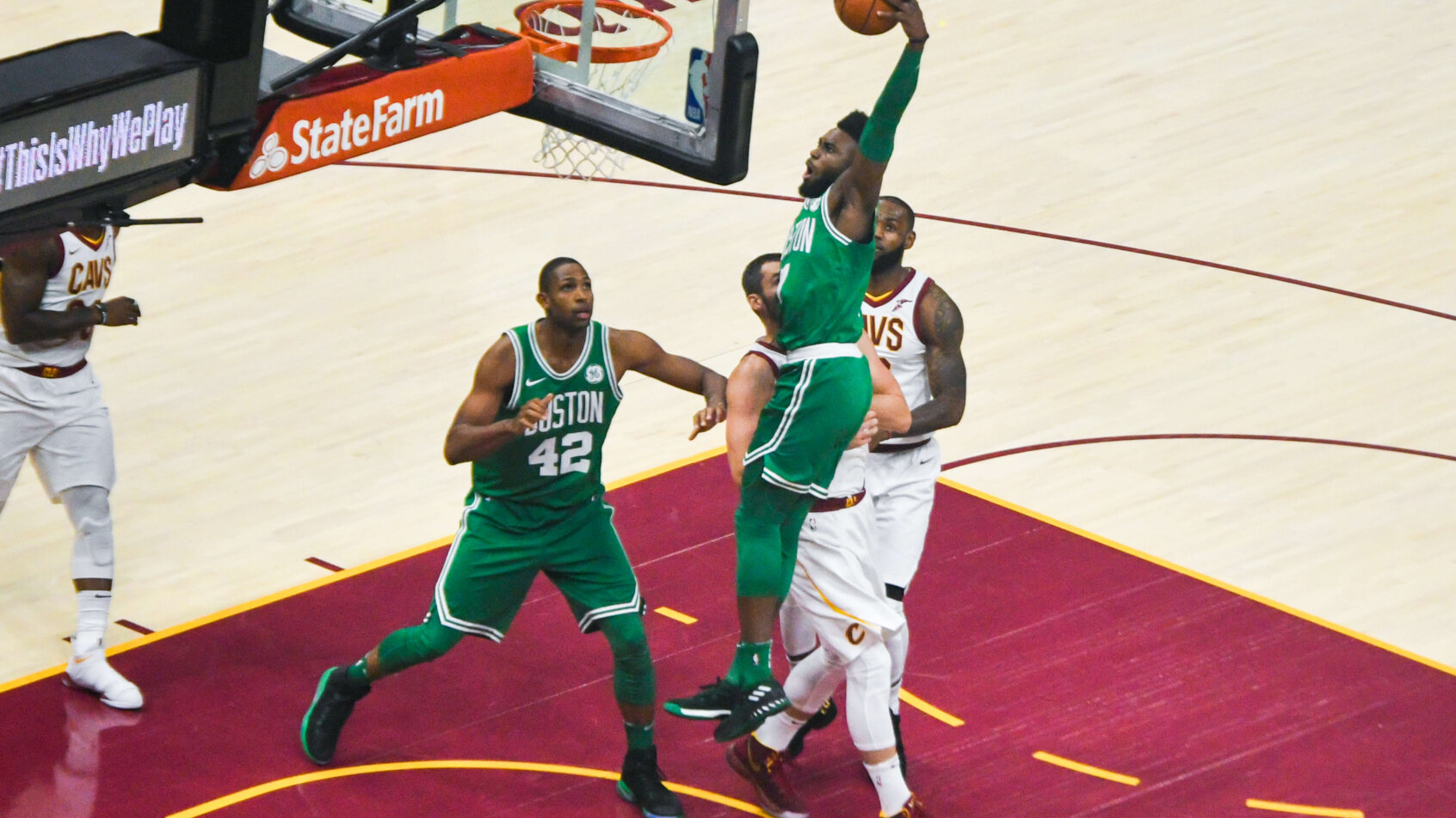 Jaylen Brown of the Celtics dunking against the Cavaliers