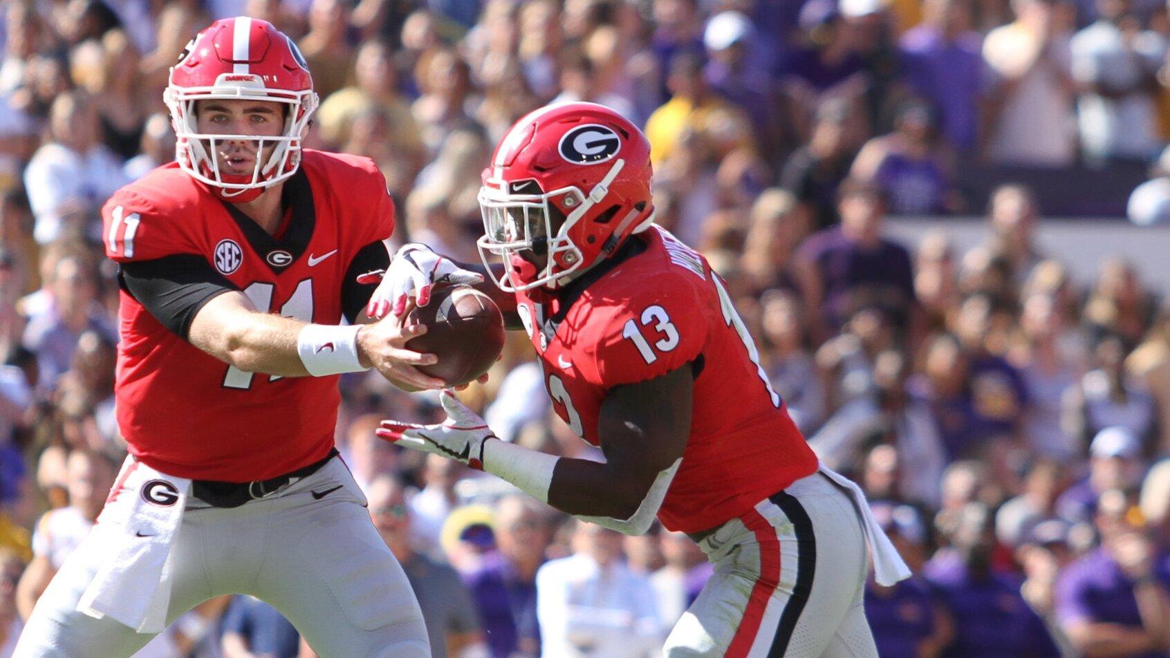 Jake Fromm handing ball off