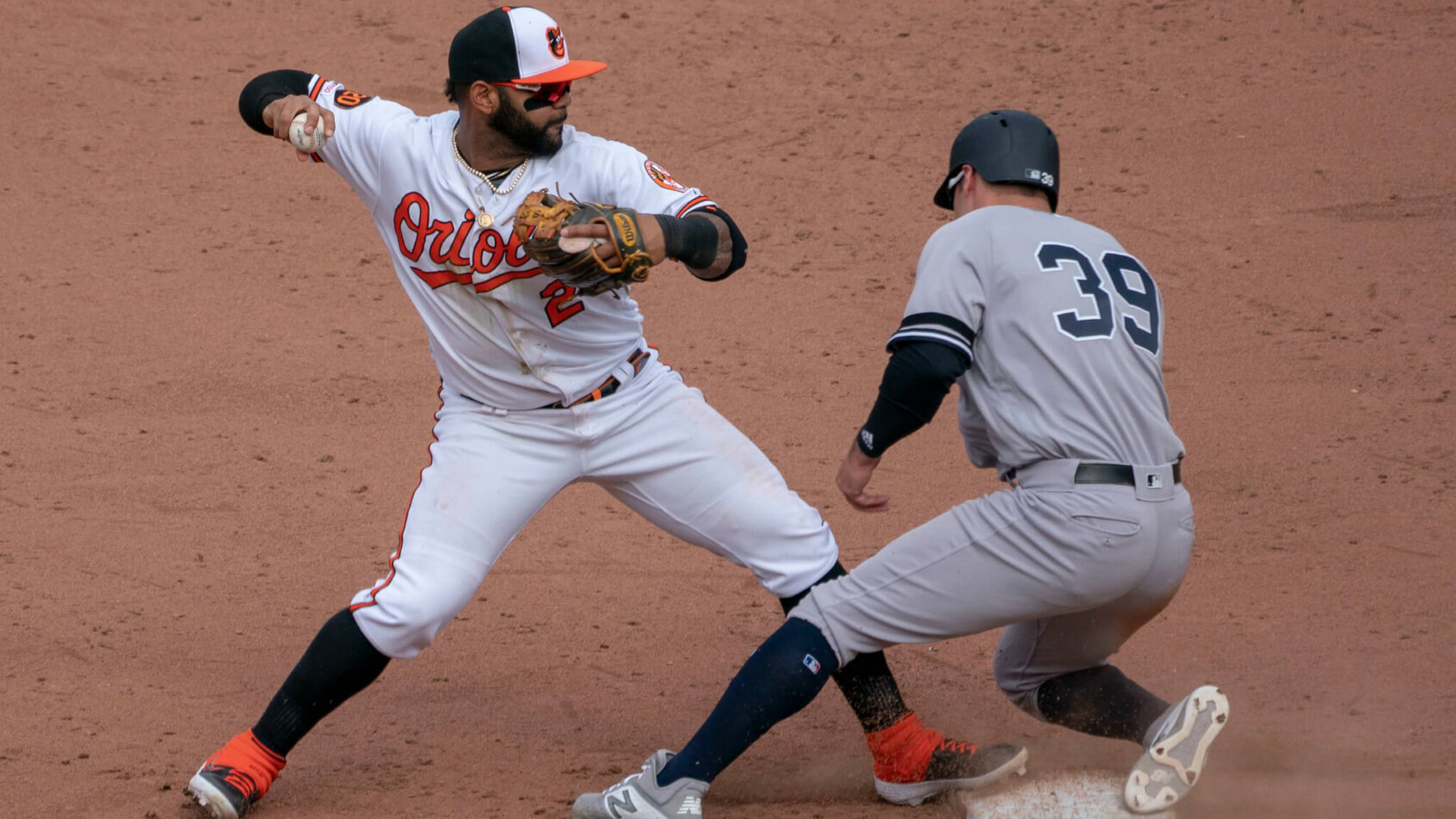 Jonathan Villar forces Mike Tauchman out at second.