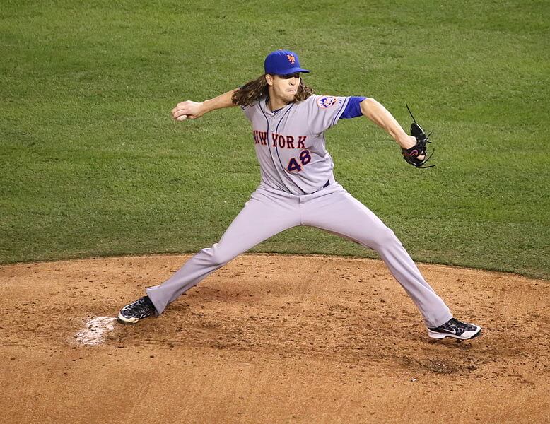 Jacob deGrom delivering a pitch