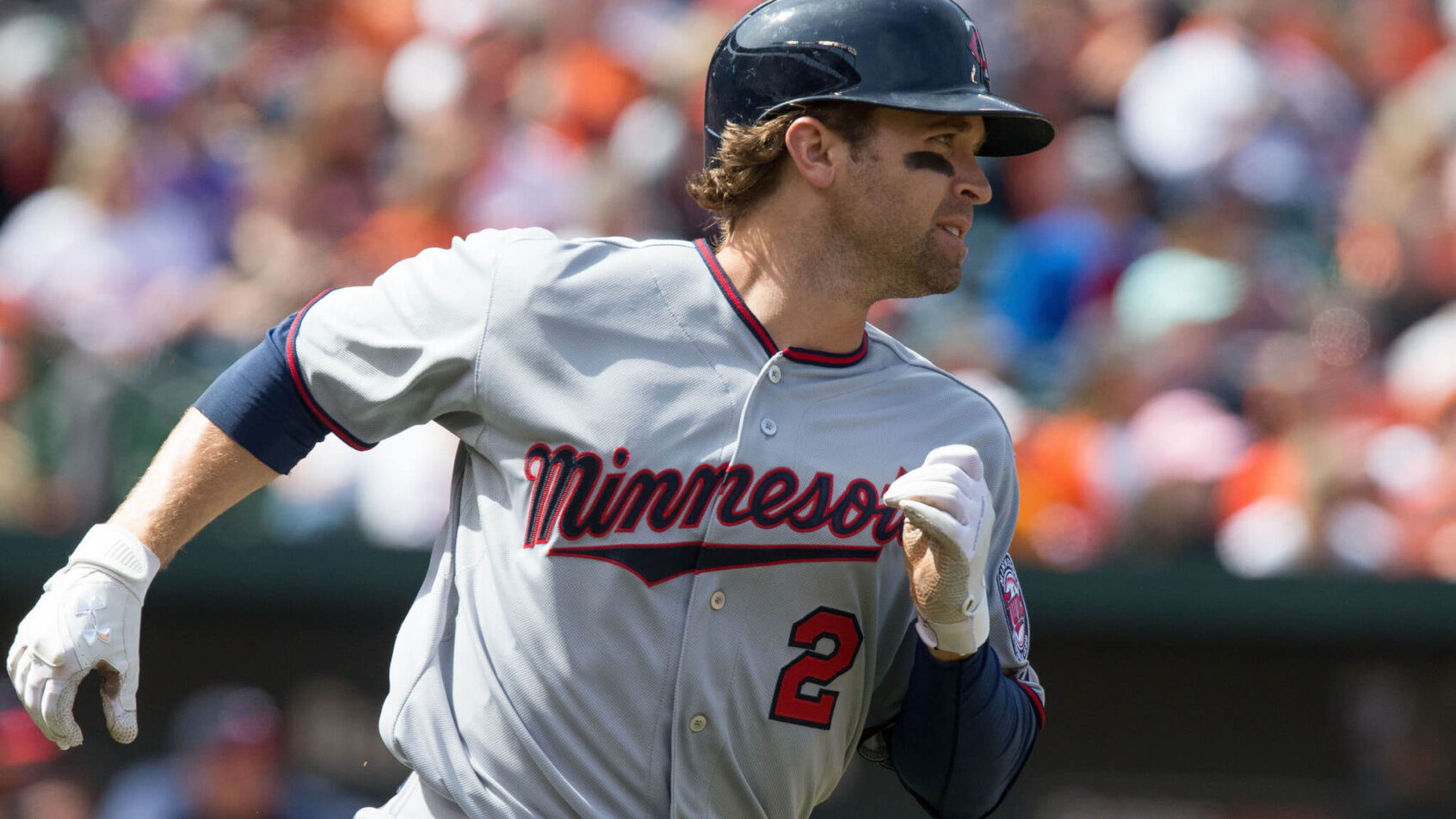 Brian Dozier runs to first base