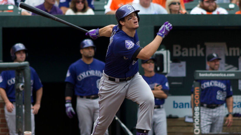 Nolan Arenado connects with a pitch.