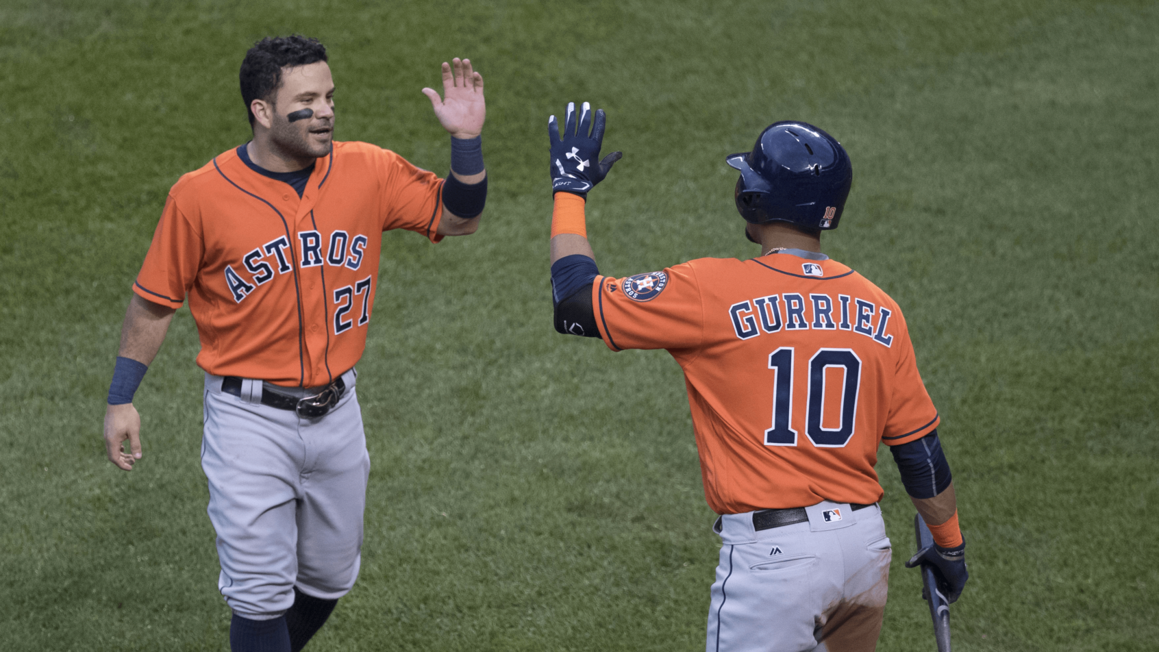 Houston's Jose Altuve and Yuri Gurriel high-fiving