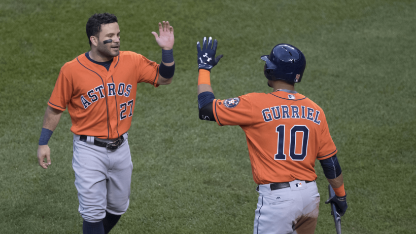 Houston's Jose Altuve and Yuri Gurriel high-fiving