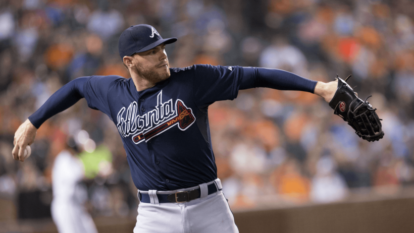 Freddie Freeman throwing baseball